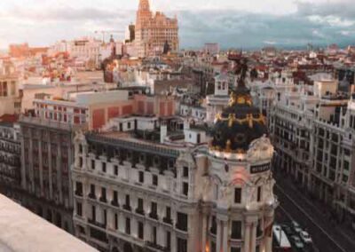 Scenic rooftop view of Madrid cityscape at sunset